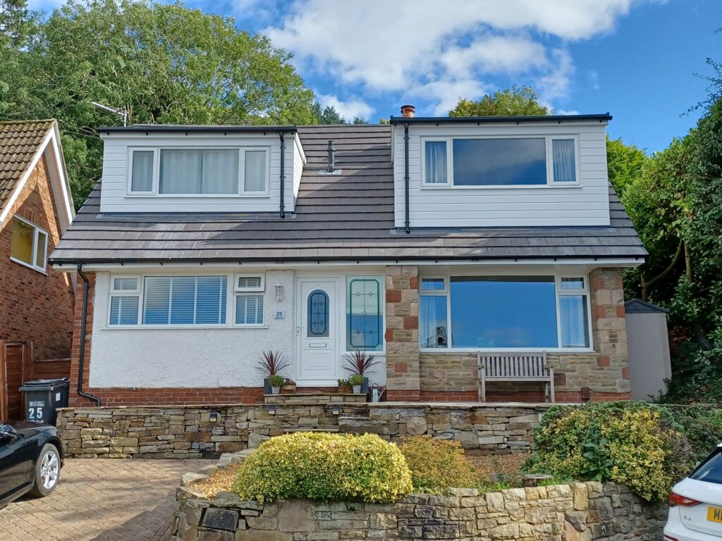 new roofing on a house with an extension