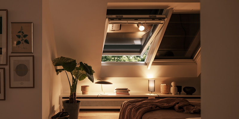 velux windows in a bedroom that are blacked out